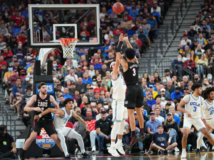 Andrew Nembhard shoots over Jaime Jaquez Jr.